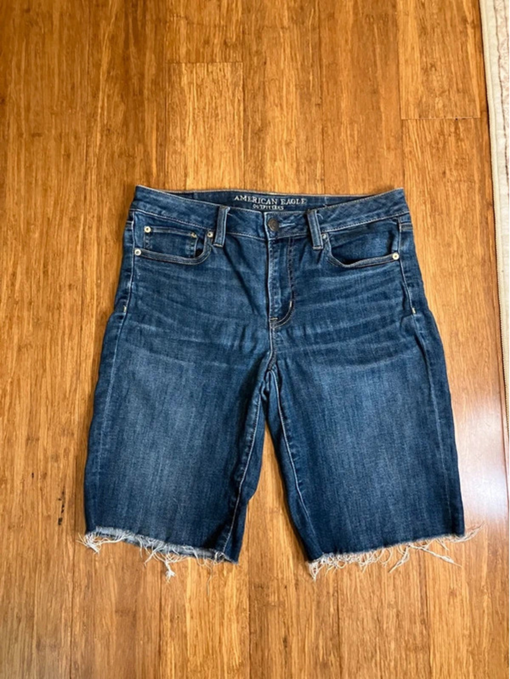 American Eagle Womens 12 Bermuda Jean Shorts Dark Wash Raw Hem Stretch Denim